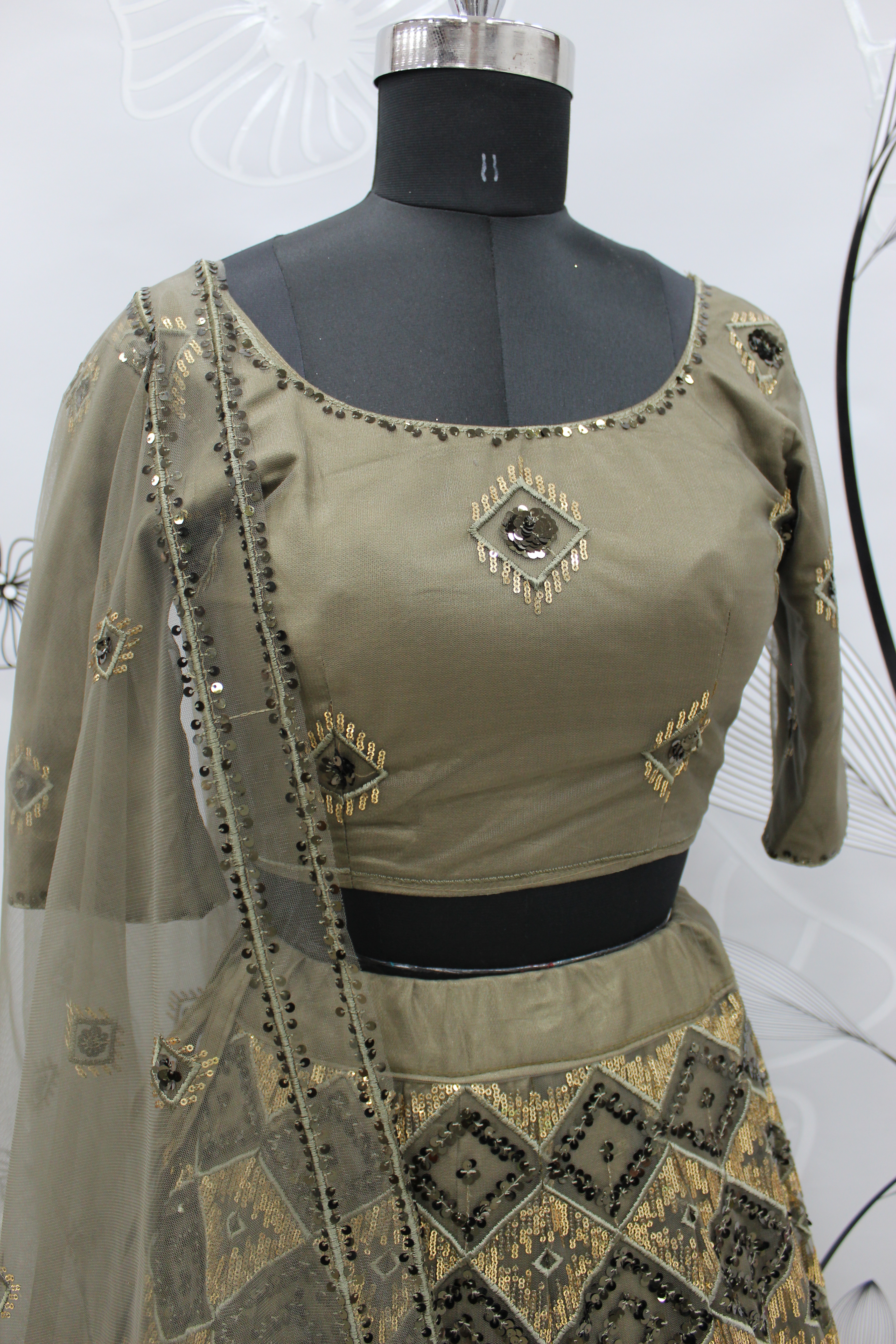 Lehenga Choli in Olive green Net with Embroidered